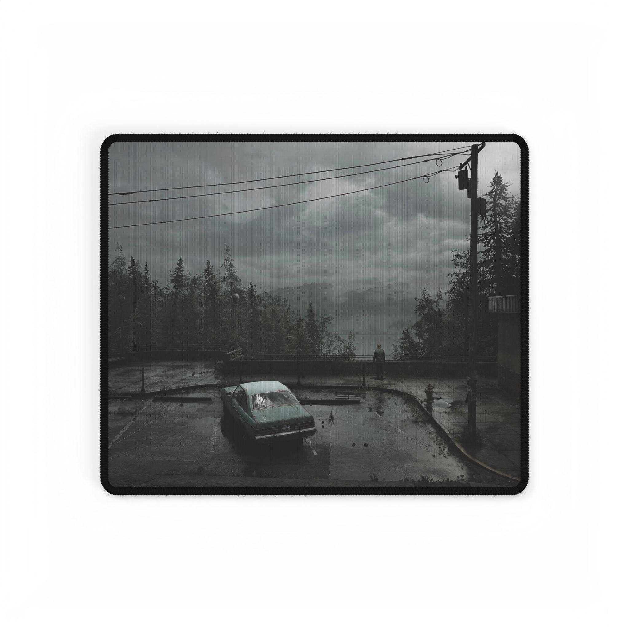 Gaming setup featuring the Silent Hill 2 Ghost Town desk mat