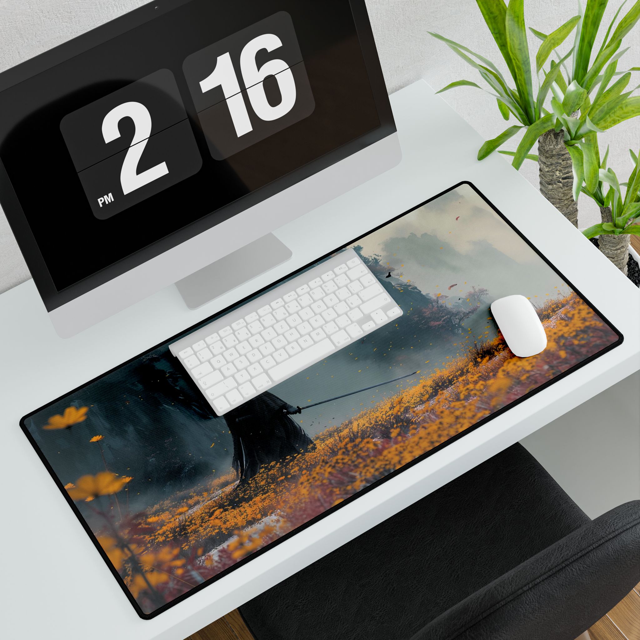 Ghost of Yotei desk mat in a gaming setup with keyboard and mouse